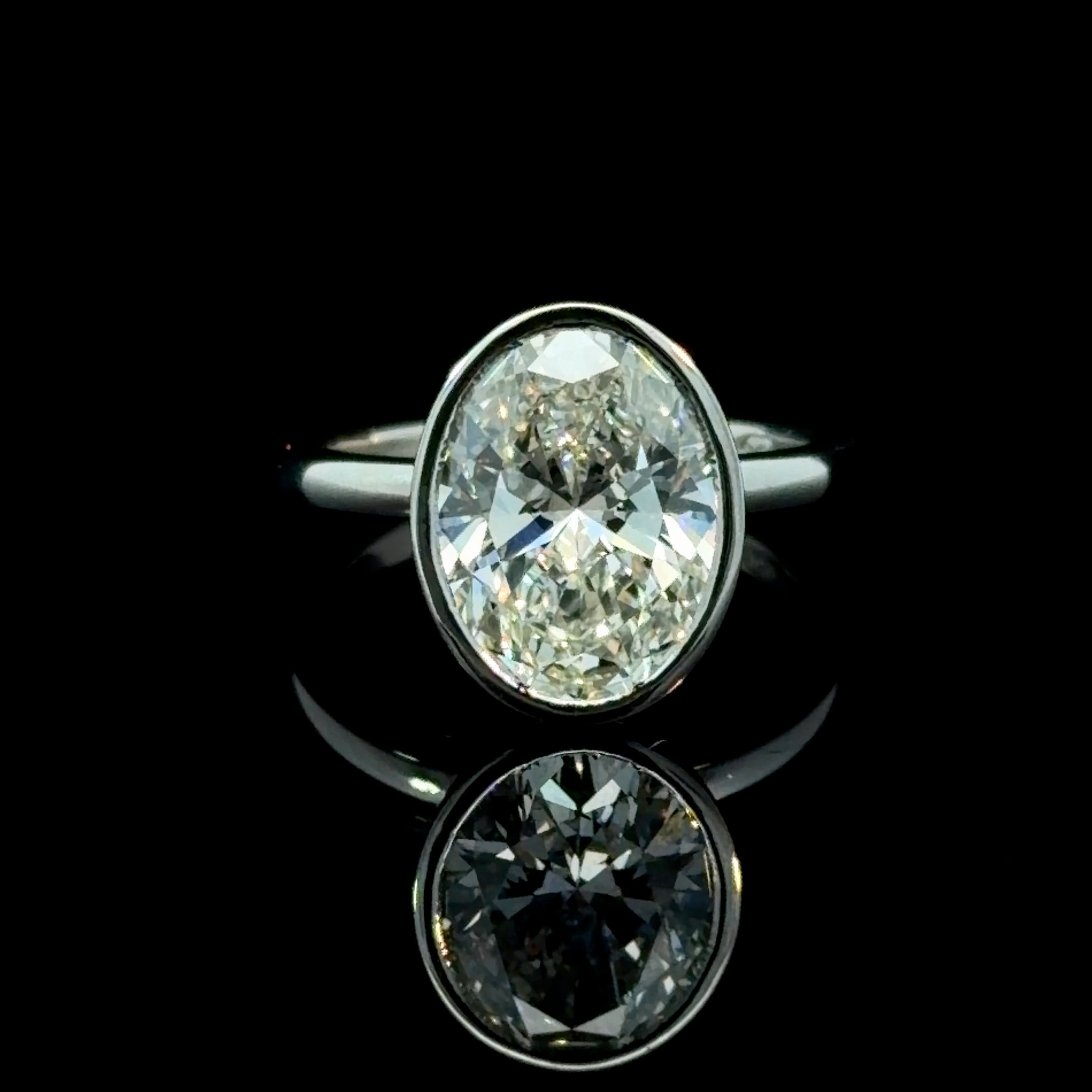 Oval Cut Lab Grown Diamond Bezel Set Solitaire Engagement Ring | 14K White Gold