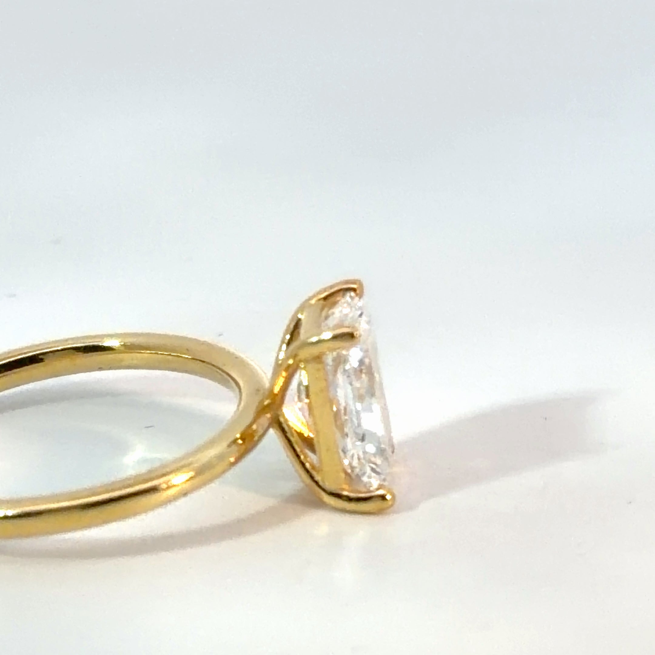 Radiant Solitaire Cathedral Setting – Yellow Gold